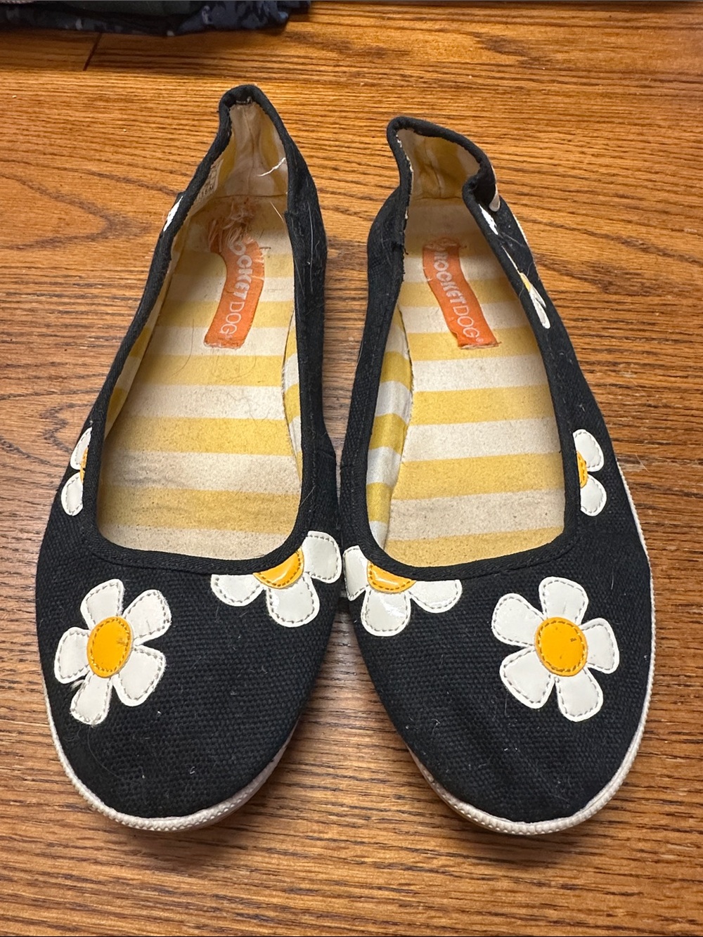 Rocket Dog Black Canvas Daisy Slip-On Flats with Yellow Centers
